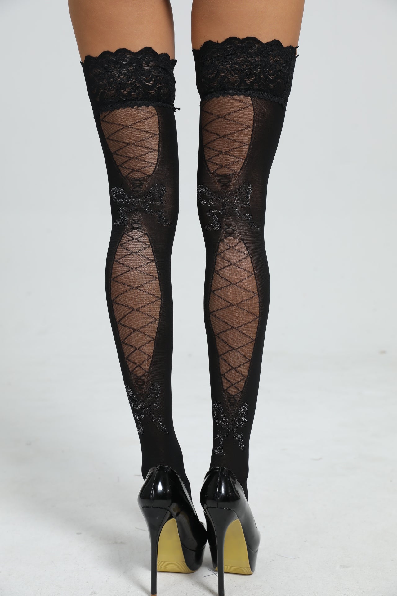 Halterlose Strümpfe mit Schleifenmuster | Schwarz